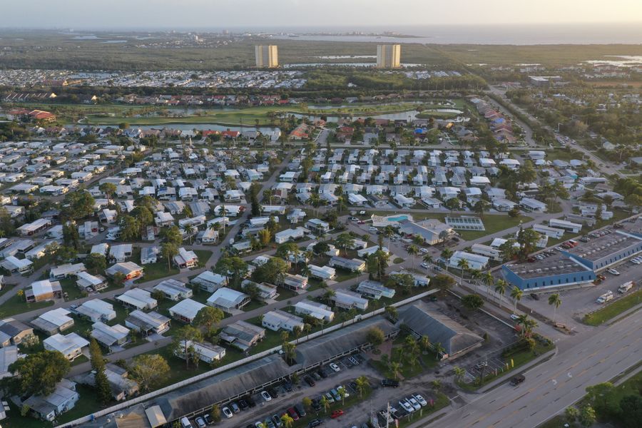 Aerial view of a mobile home community at sunset