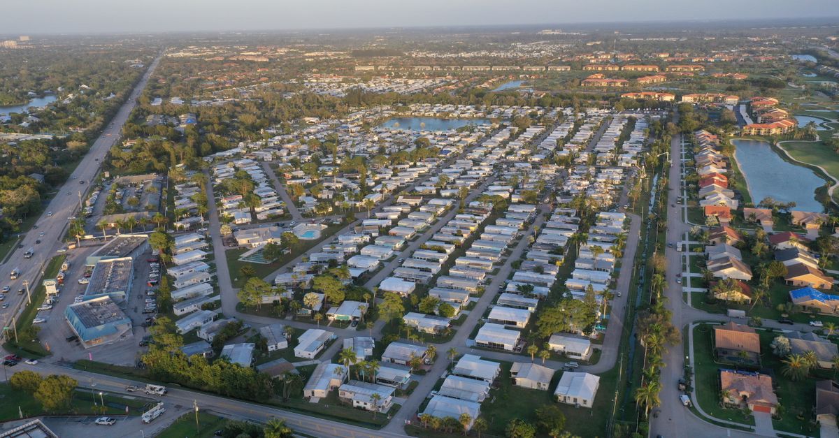 Aerial view showcasing the grid-like pattern of a residential neighborhood in Fort Myers, Florida.