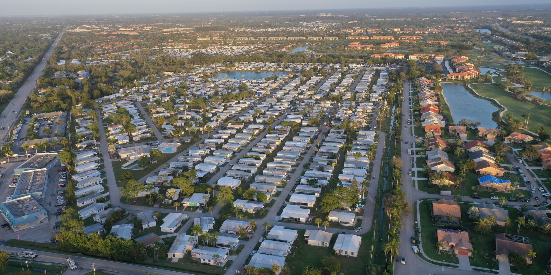 Aerial photo showcasing a suburban neighborhood in Fort Myers, Florida, with clear skies and organized streets.