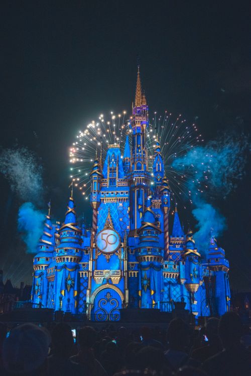 Free Spectacular fireworks illuminate Disney's Cinderella Castle at night in Orlando, Florida. Stock Photo