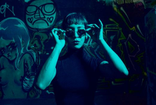 Woman in Black Tank Top Wearing Black Sunglasses