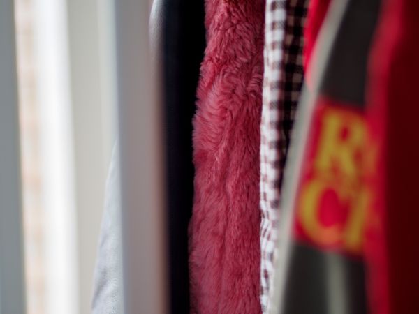 Freshly cleaned garments hanging on a rack