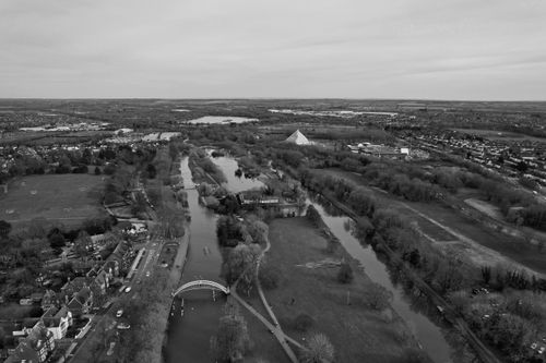 Free Black and white aerial view showcasing the river and urban landscape of Bedford, UK. Stock Photo