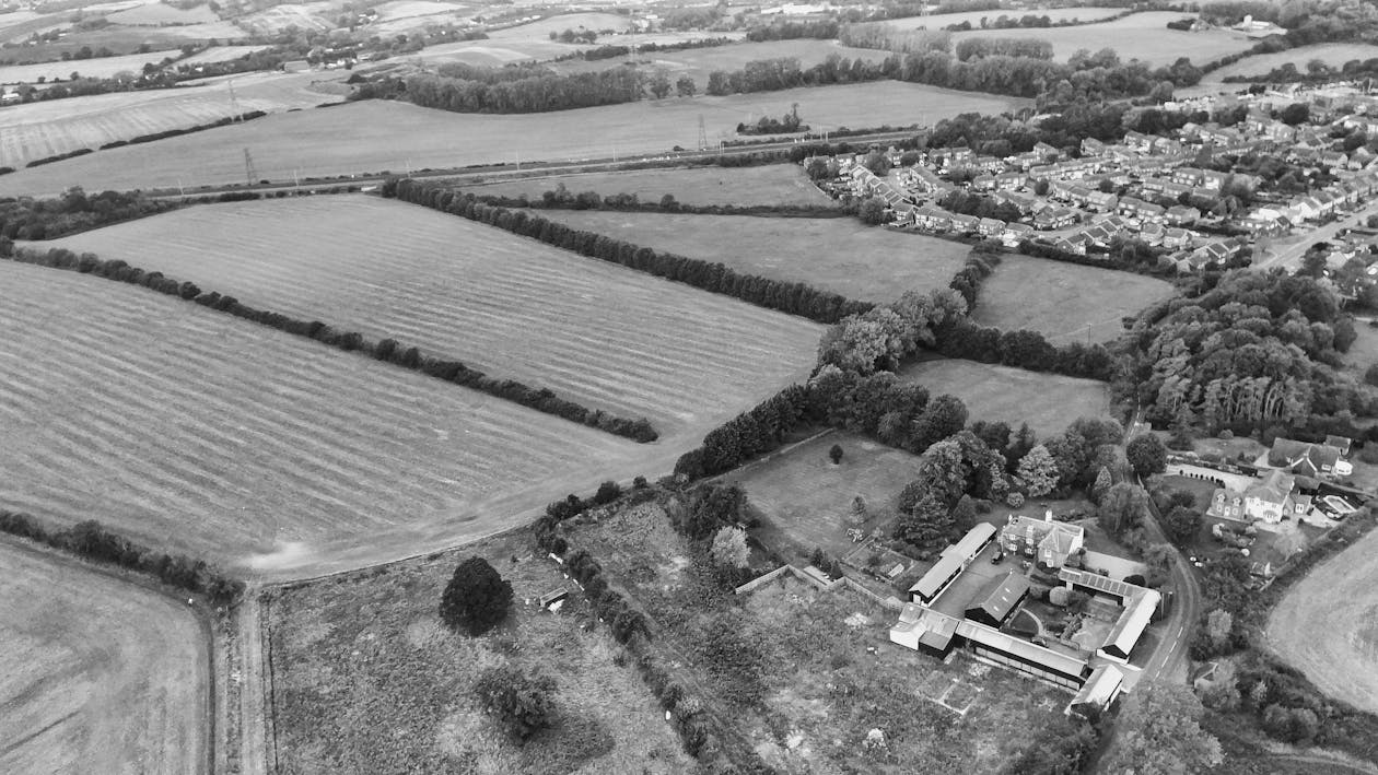 Grayscale Birds Eye View of a Countryside in England