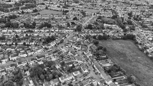 Free Aerial view of suburban Luton, England, showcasing housing and streets in monochrome. Stock Photo