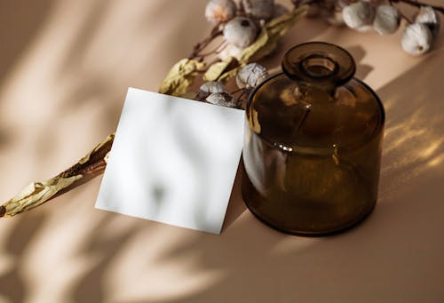 Free Paper Card and Bottle Stock Photo