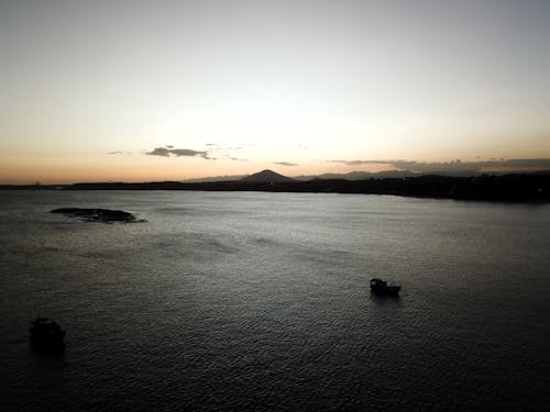 Безкоштовне стокове фото на тему «берег, Захід сонця, знімок із дрона»