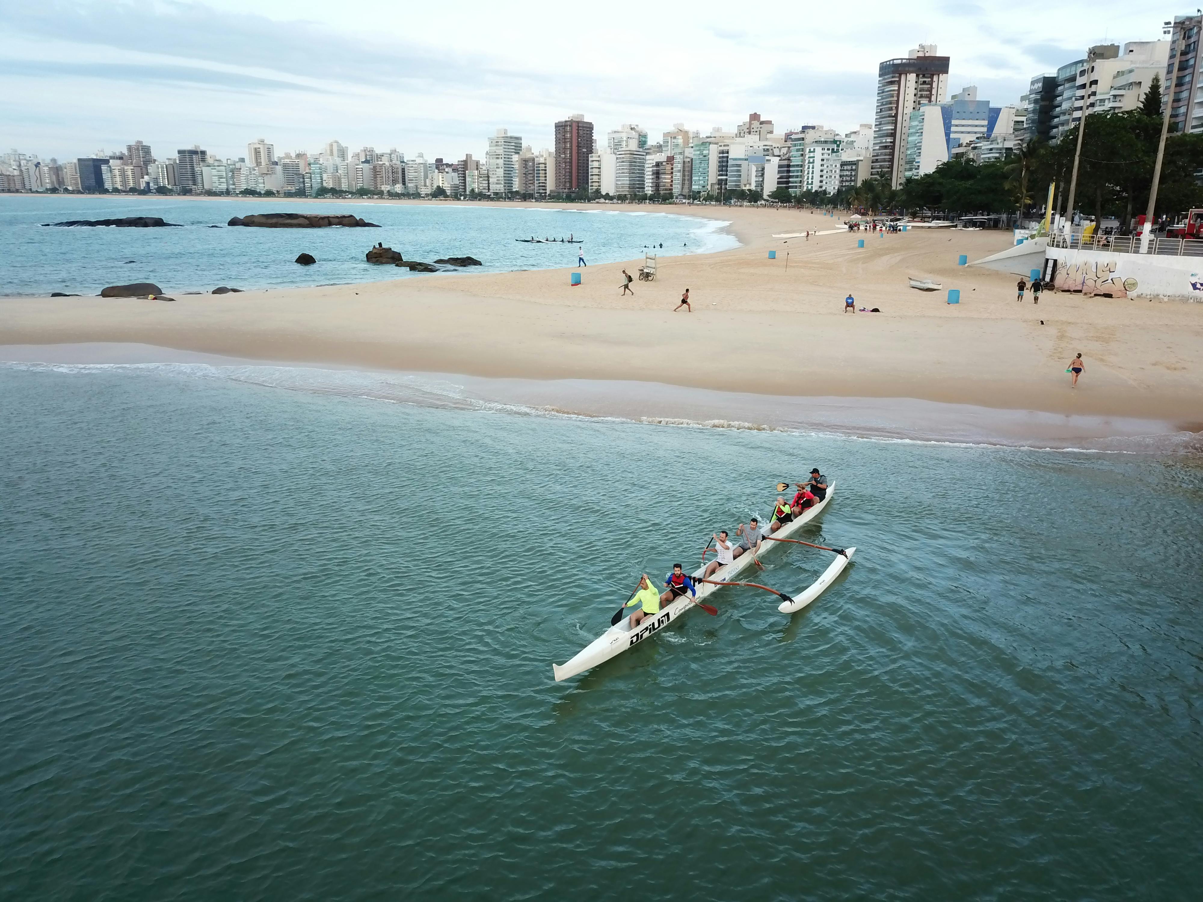 IoT sensors in agricultural fields transmitting data to cloud insurance systems