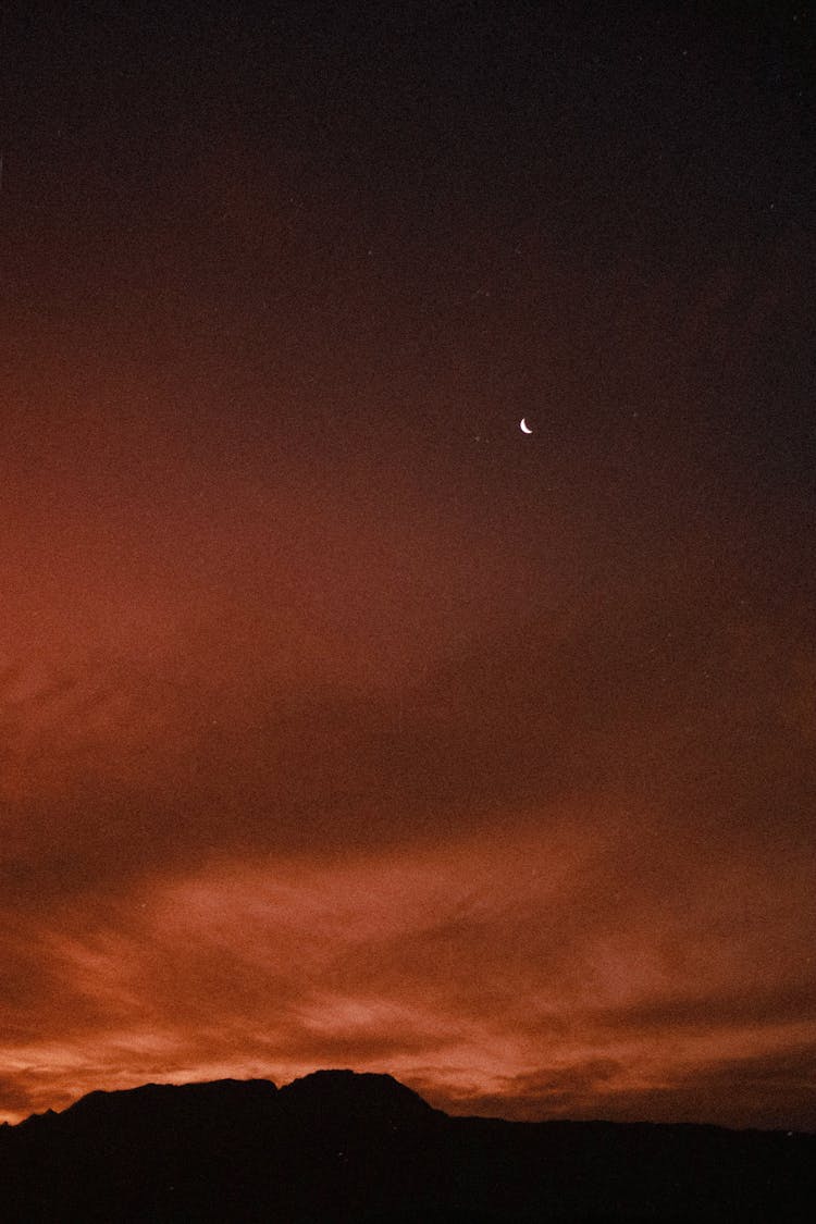 Crescent Moon Over Dramatic Sky