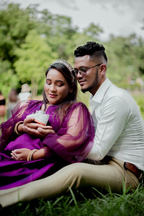Young Man and Woman on a Pregnancy Photoshoot 
