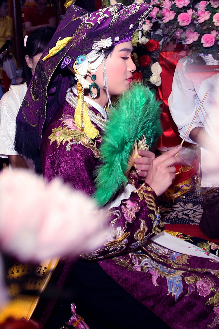 Woman In Traditional Costume At Ceremony