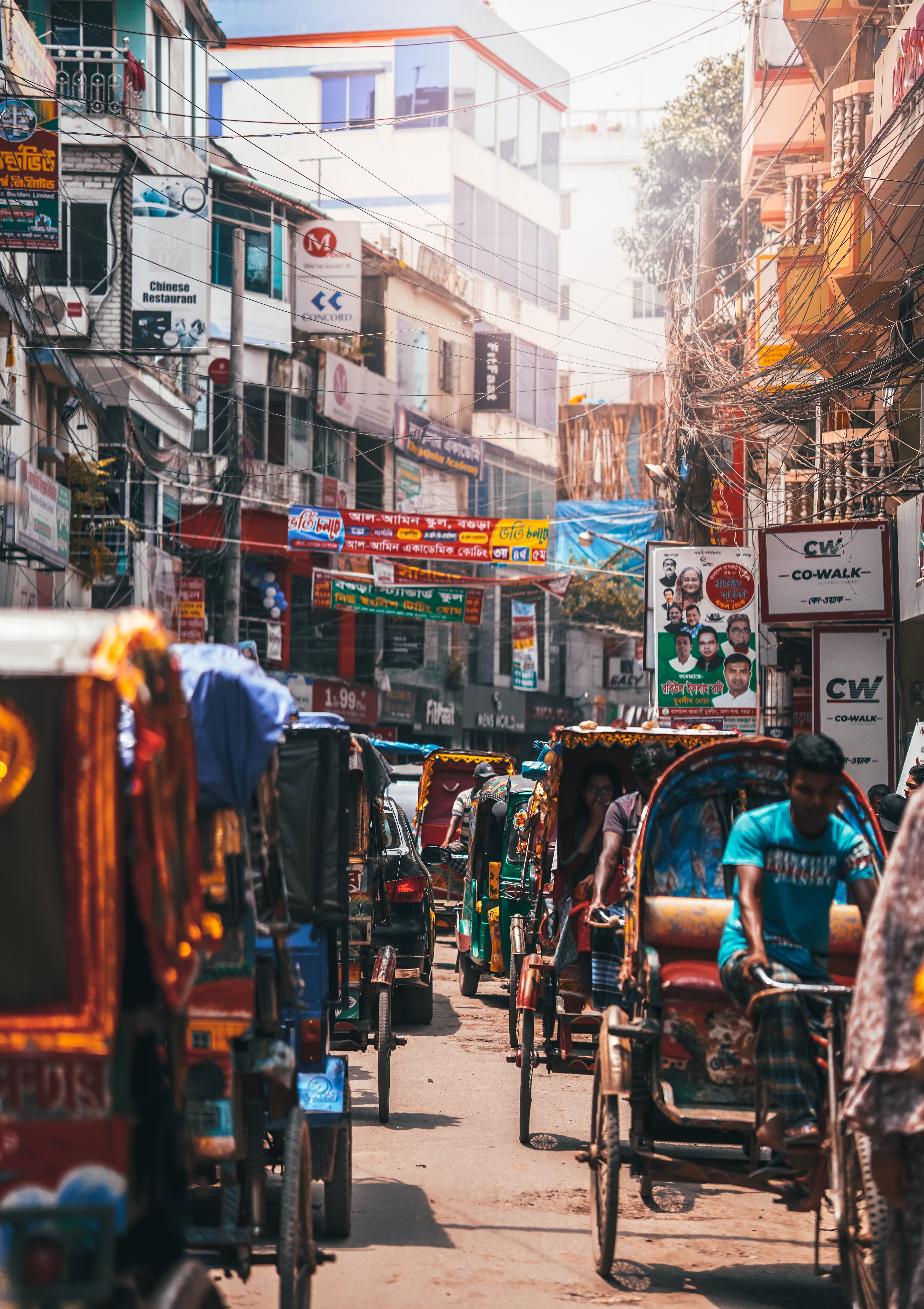 Varanasi Rickshaws Rickshaws and Pedestrians on the Street of Varanasi India · Free Stock ...