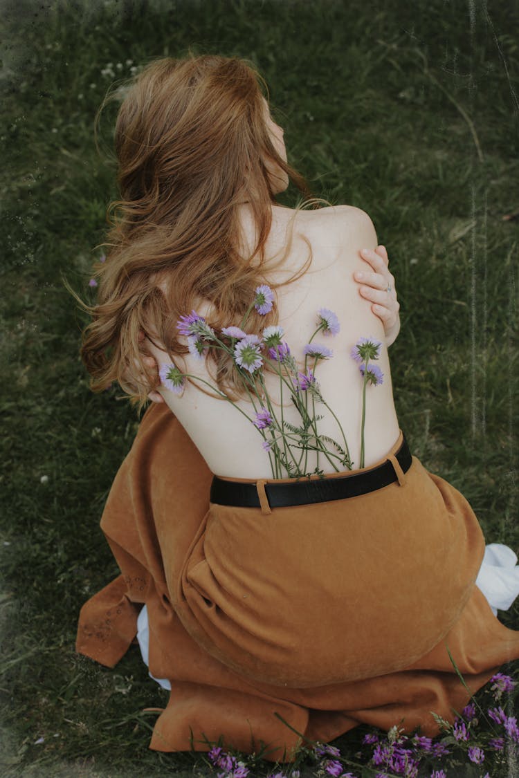 Woman With Flowers On Her Back