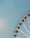 A Ferris Wheel Across the Blue Sky