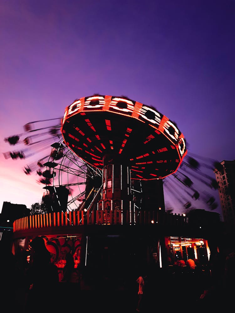 A Merry Go Round Amusement Park Ride In Motion