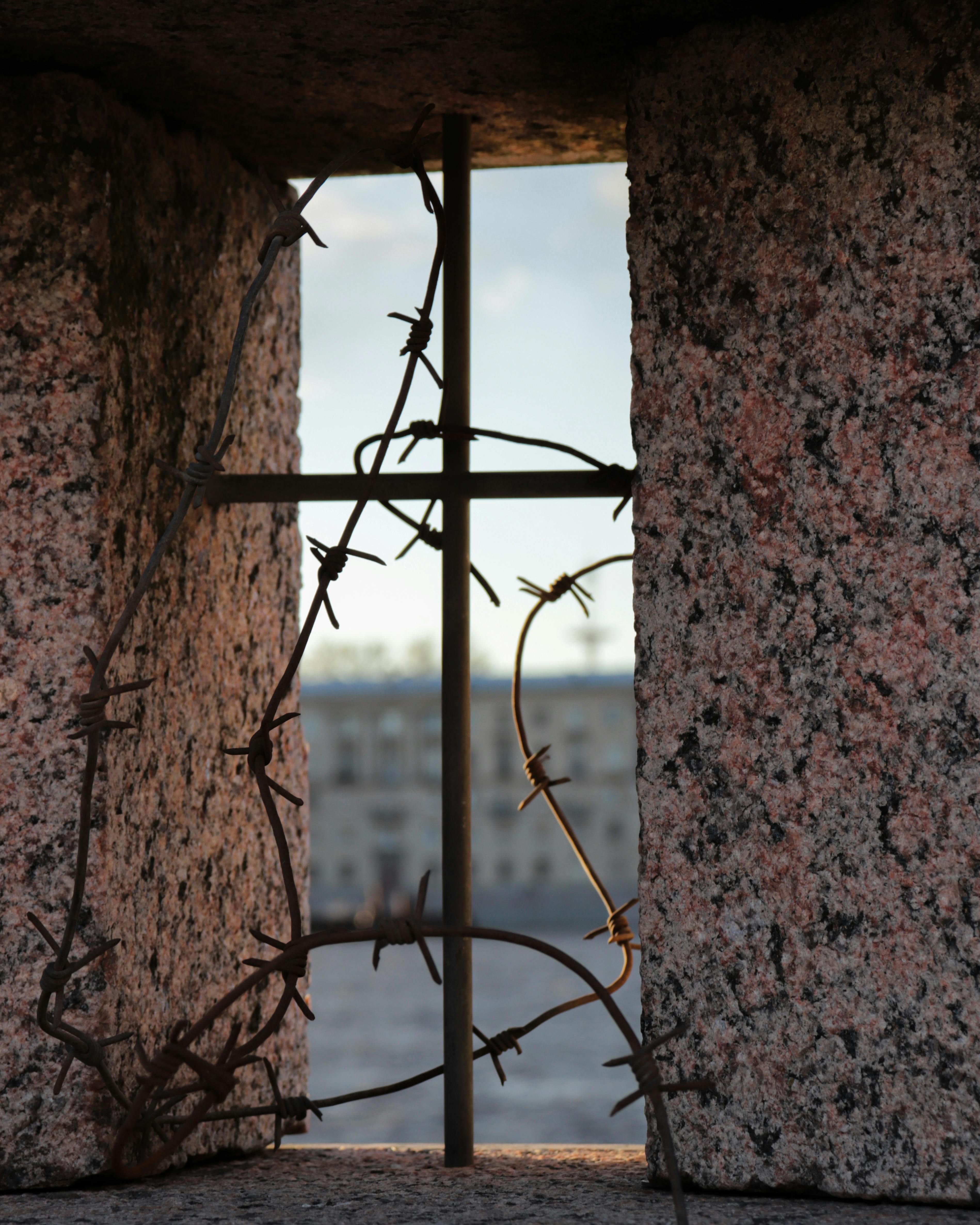 bars and barbed wire on window