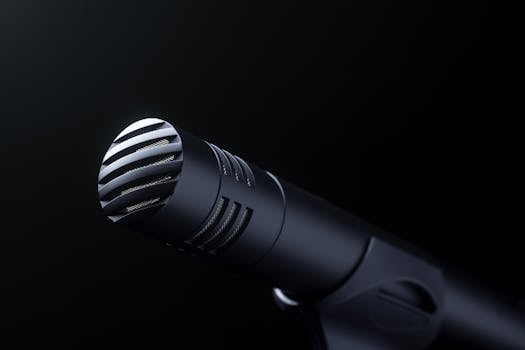 Detailed view of a sleek condenser microphone highlighting its design.