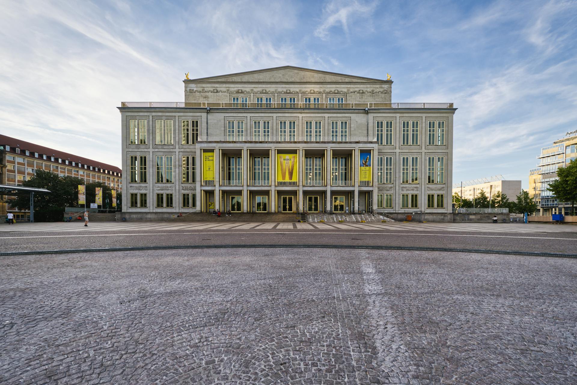 Front view of the iconic Leipzig Opera House with its neoclassical design in the daylight.