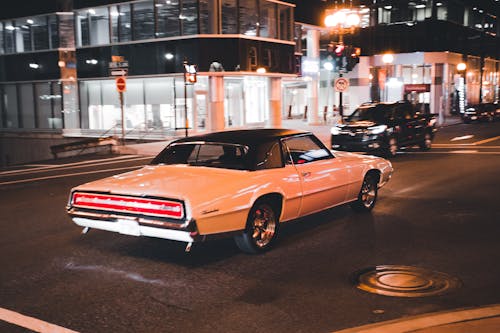 White Vintage Car on the Road