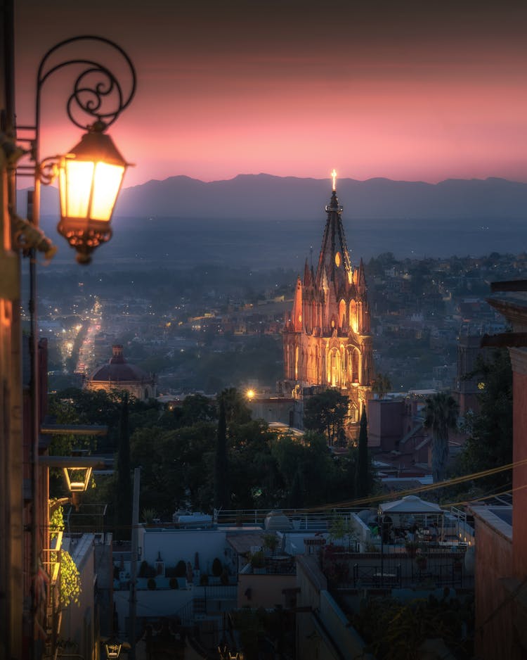 The Parroquia De San Miguel Arcangel And The Iglesia De San Rafael With The City Center Of San Miguel De Allende At Dusk In Guanajuato, Mexico
