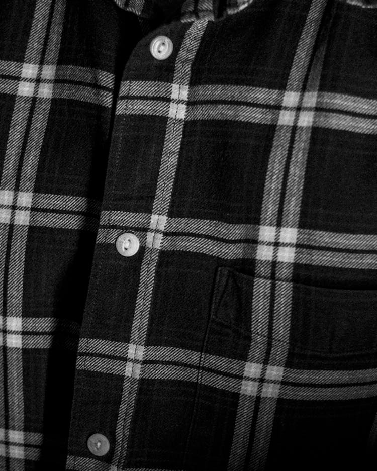 Close Up Photo Of A Plaid Button Up Shirt