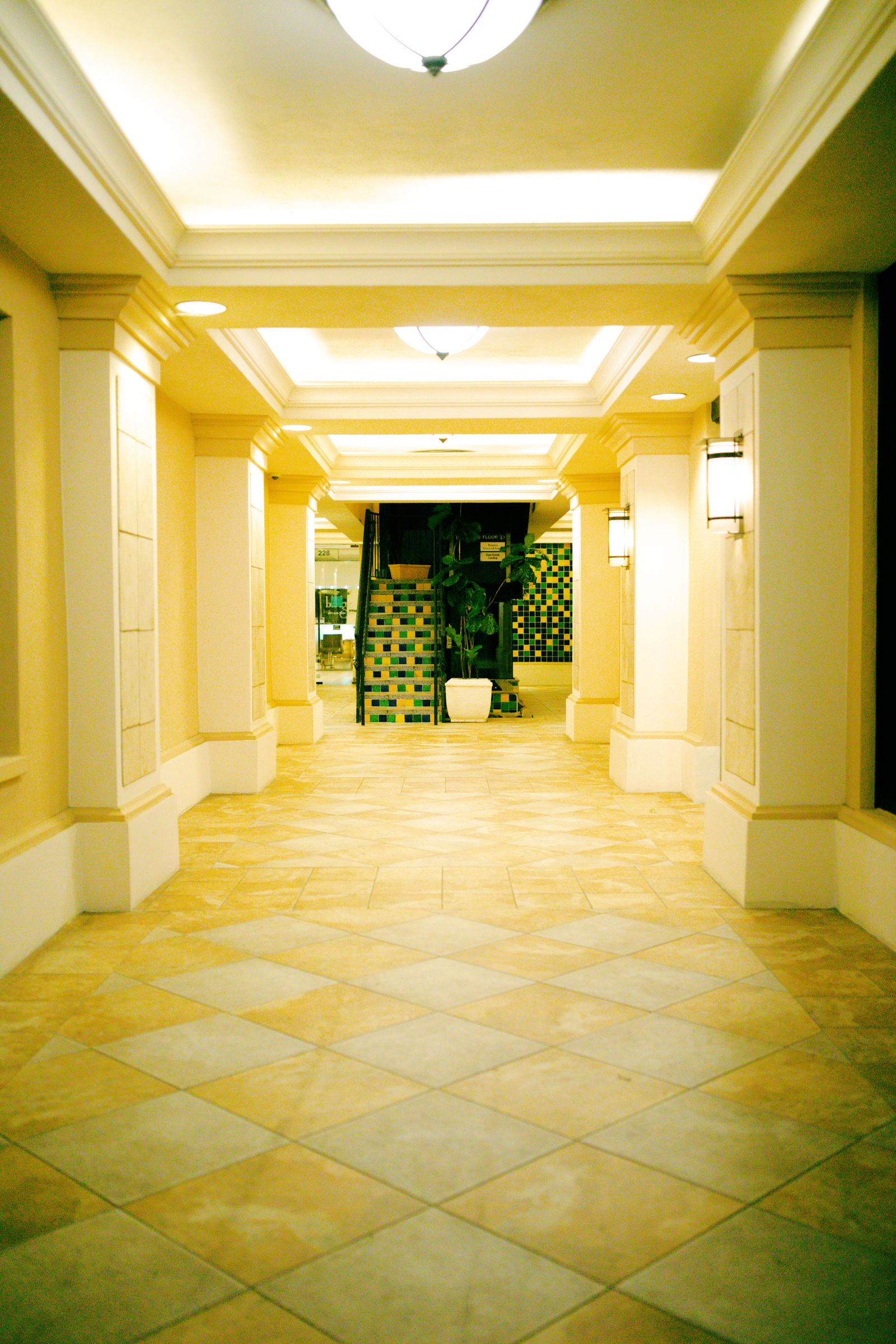 Professional tiled floor in a modern interior hallway