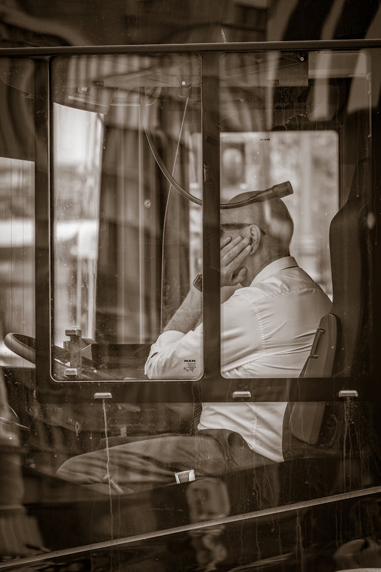 A Man Driving The Bus