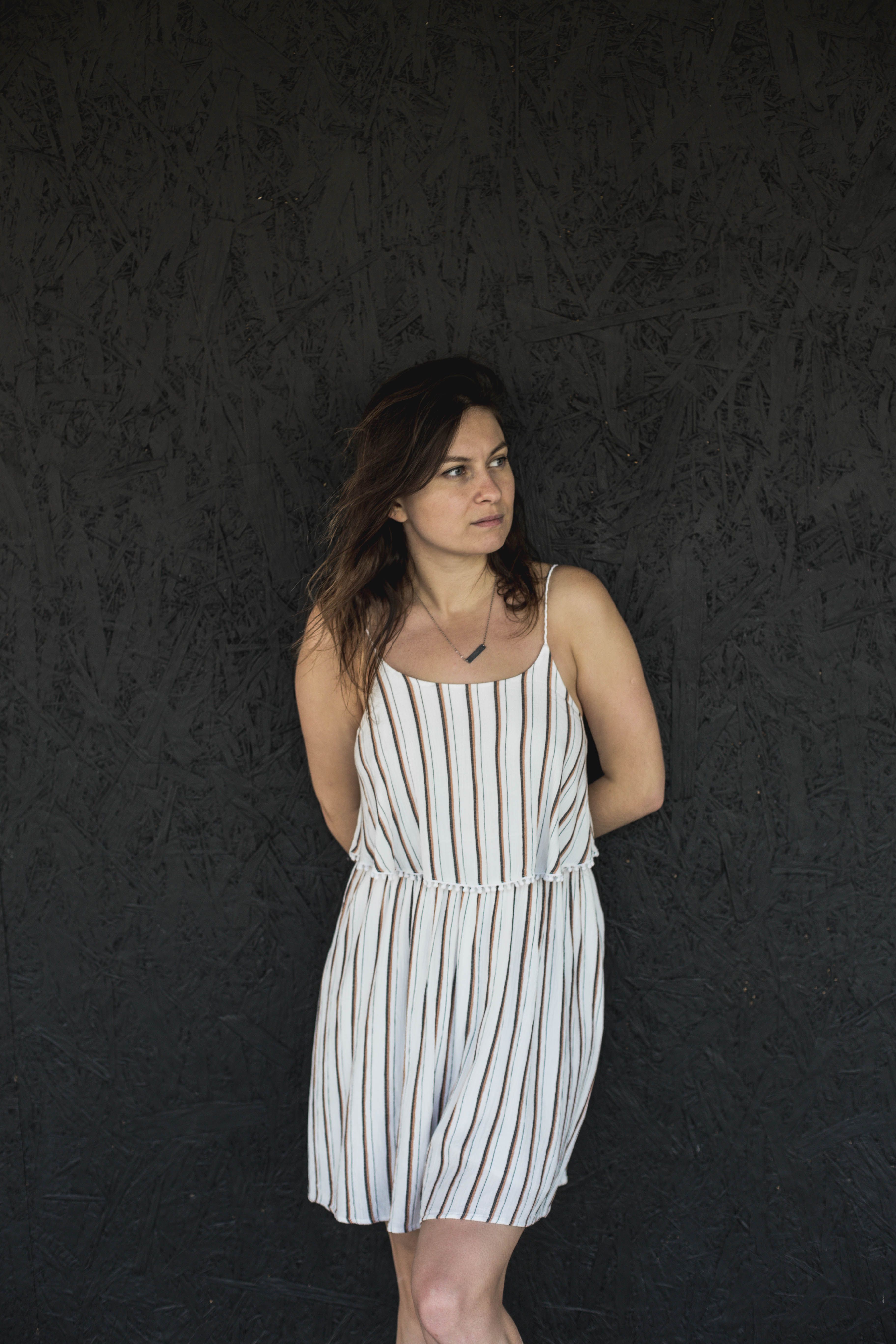 Woman in a Striped Summer Dress · Free Stock Photo