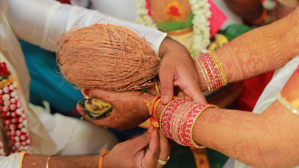 Bangles and coconut at a traditional ceremony (Naming Day Catering in Vellore)