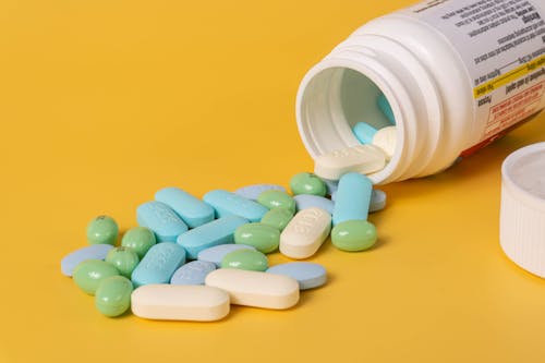 Kostnadsfri bild av bota, gul bakgrund, läkemedel
