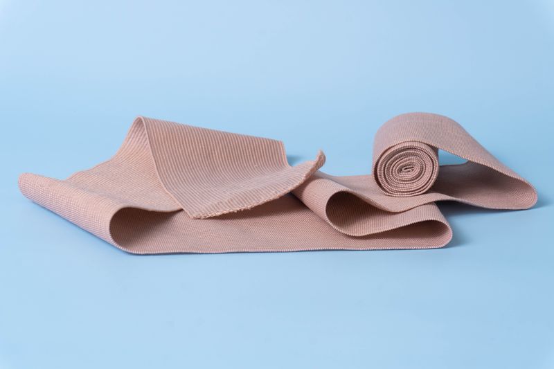 Gauze pads, elastic bandages, and wound care supplies for home first aid