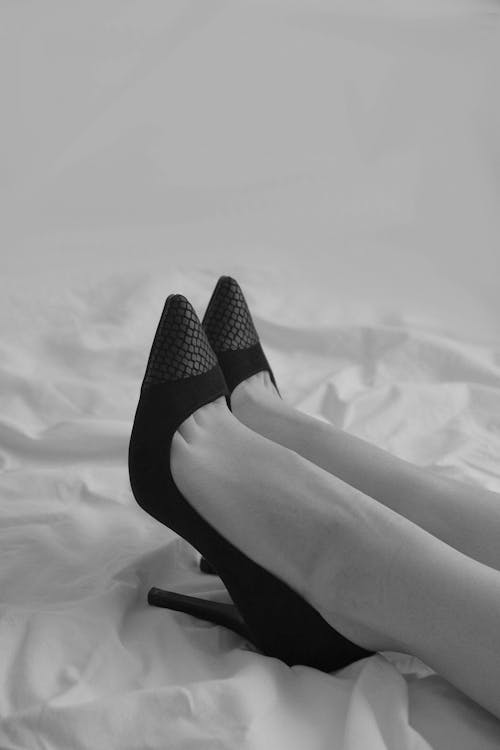A Person Wearing Heels · Free Stock Photo