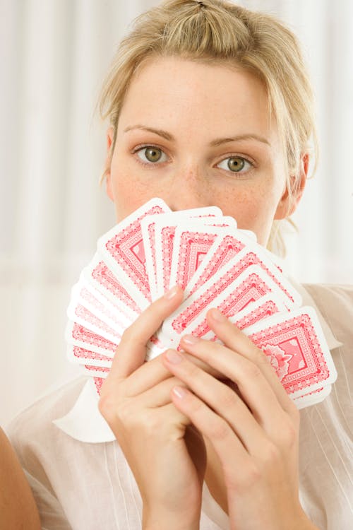 Woman Holding Poker Cards