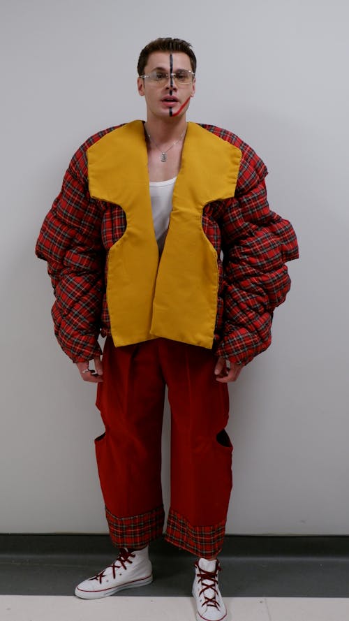 A Man in Red and Yellow Jacket