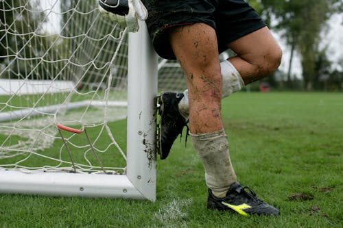 Dirty Legs of Soccer Player