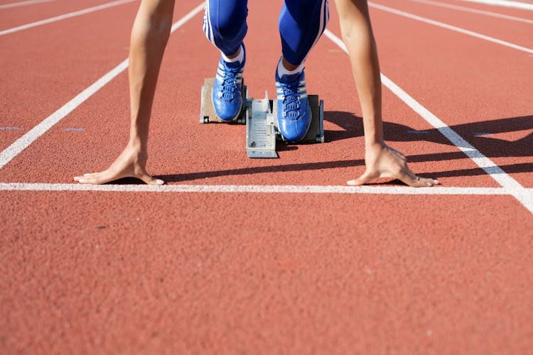 An Athlete In A Sprint Race Starting Position