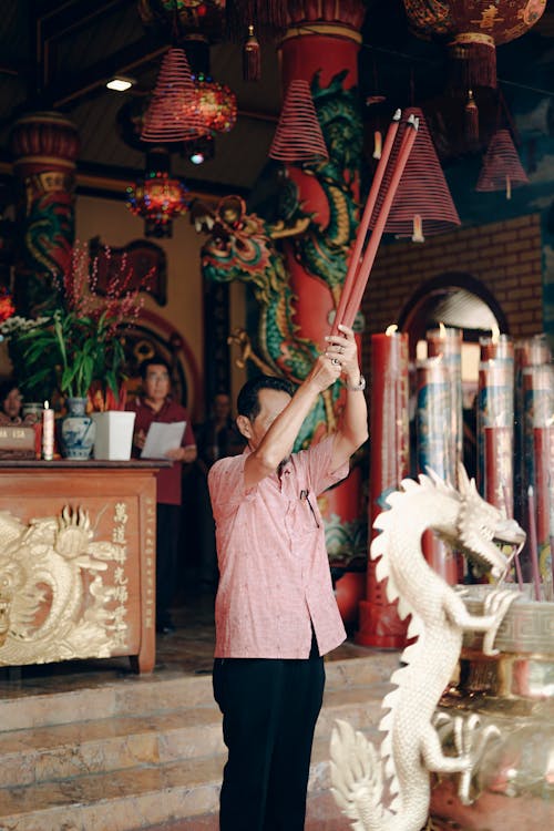 Man Praying at Chinese New Year 
