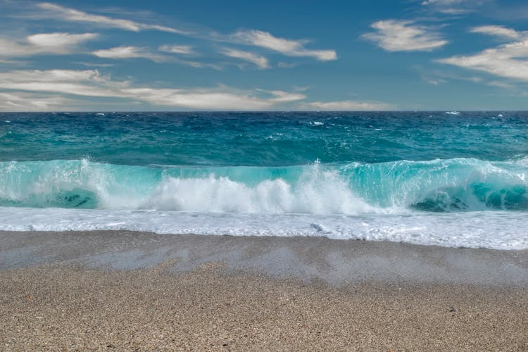 A Wave Crashing On The Shore 