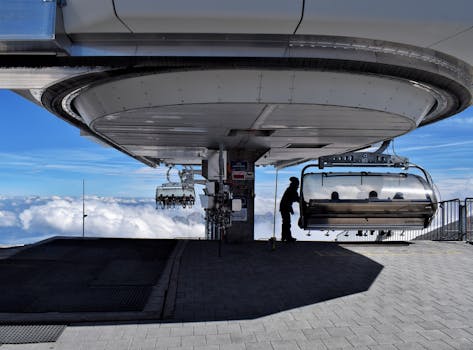 A scenic cable car station in Gadmen, Switzerland, offering breathtaking views above the clouds.