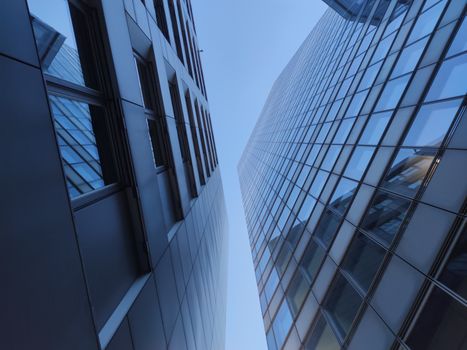 A low-angle view of modern skyscrapers showcasing Cologne's urban architecture.