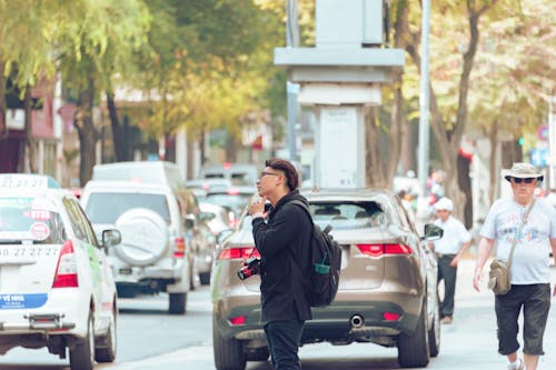 Man Standing Near Road