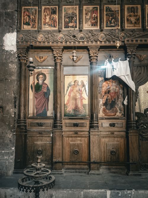 Free Explore the intricate wooden design and religious paintings inside a vintage Orthodox church. Stock Photo