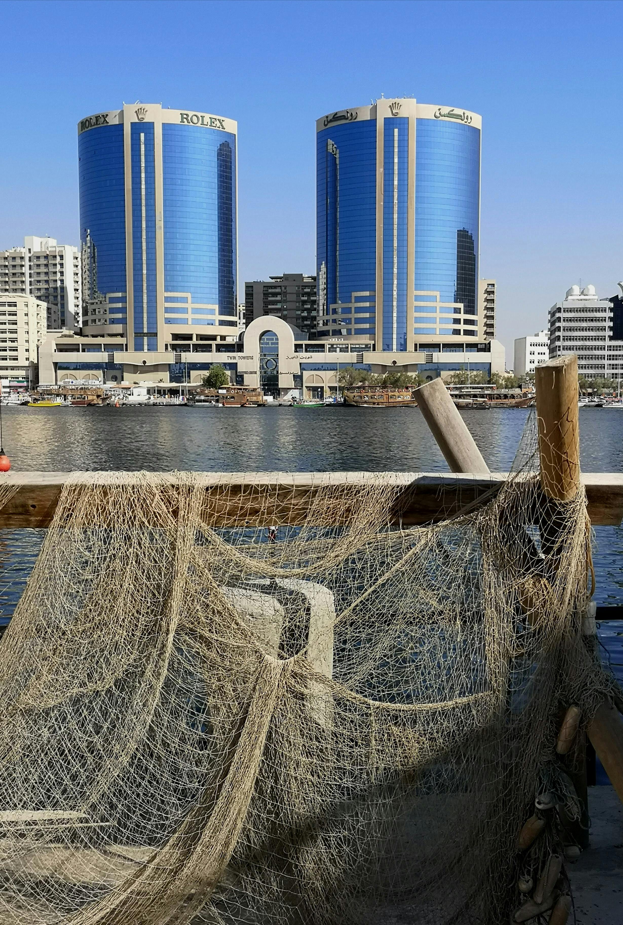 city buildings under the blue sky