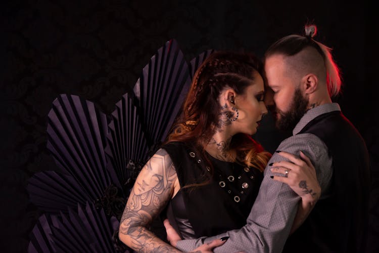 Woman With Tattoos With Man