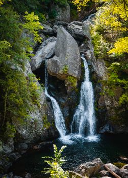 Beautiful waterfall cascading through lush greenery in Ohio's natural landscape.