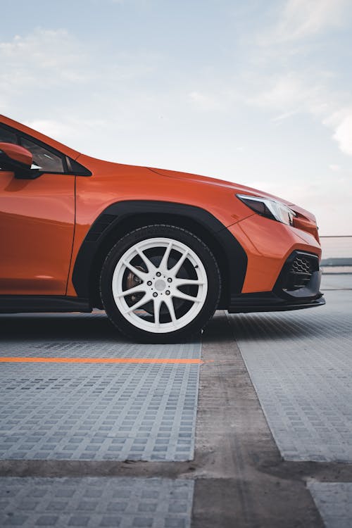 Side View of an Orange Subaru WRX