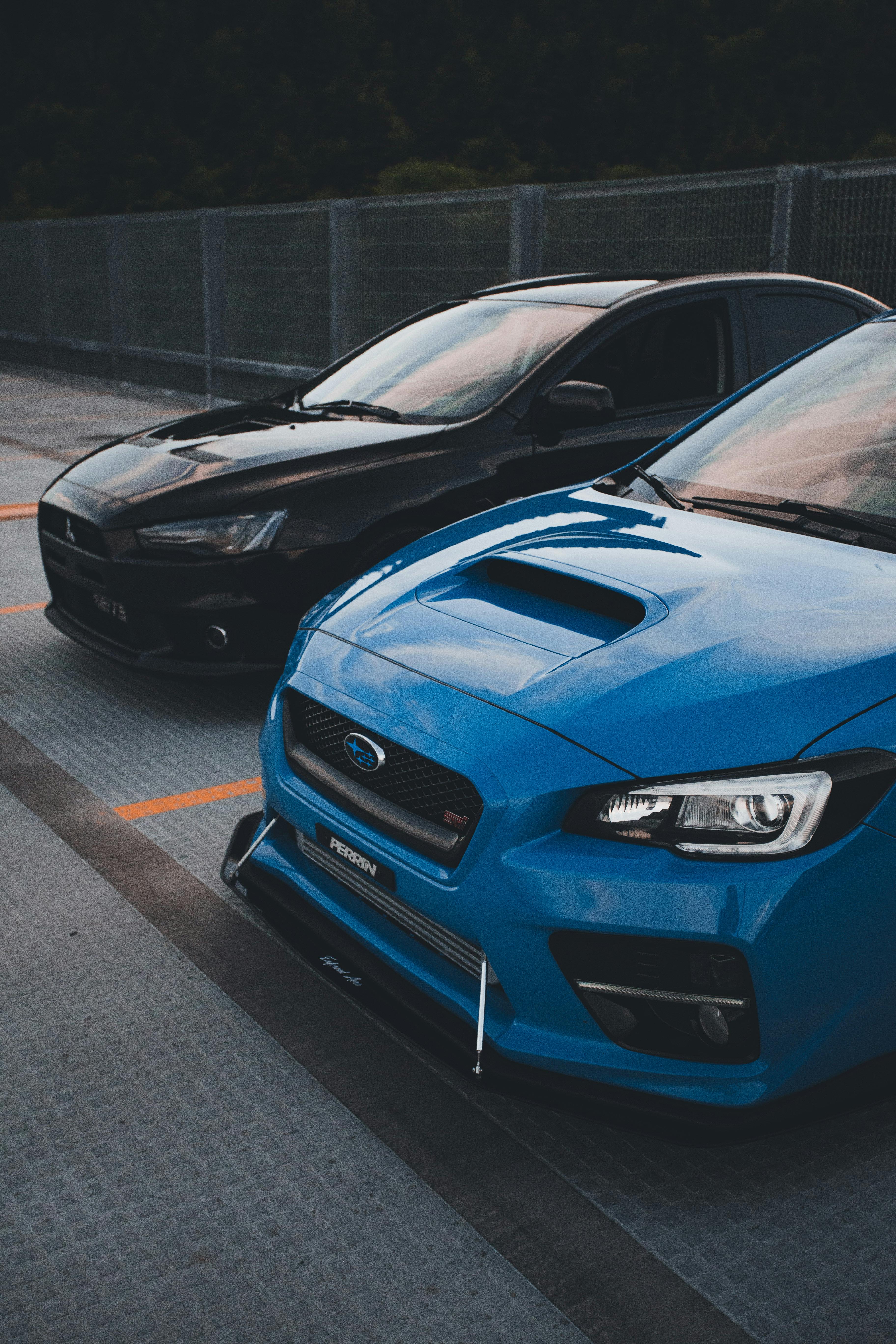 Blue and Black Cars Parked · Free Stock Photo