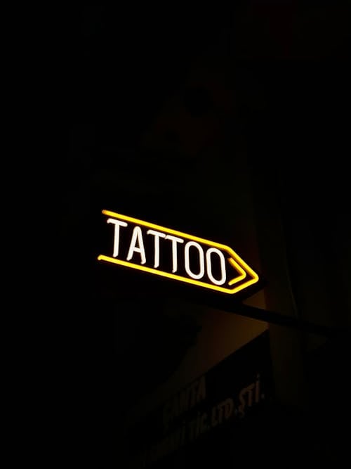 Free Photo of a Tattoo Neon Signage Stock Photo