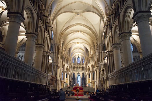 Interior view of the majestic Gothic arches in Canterbury Cathedral, England.