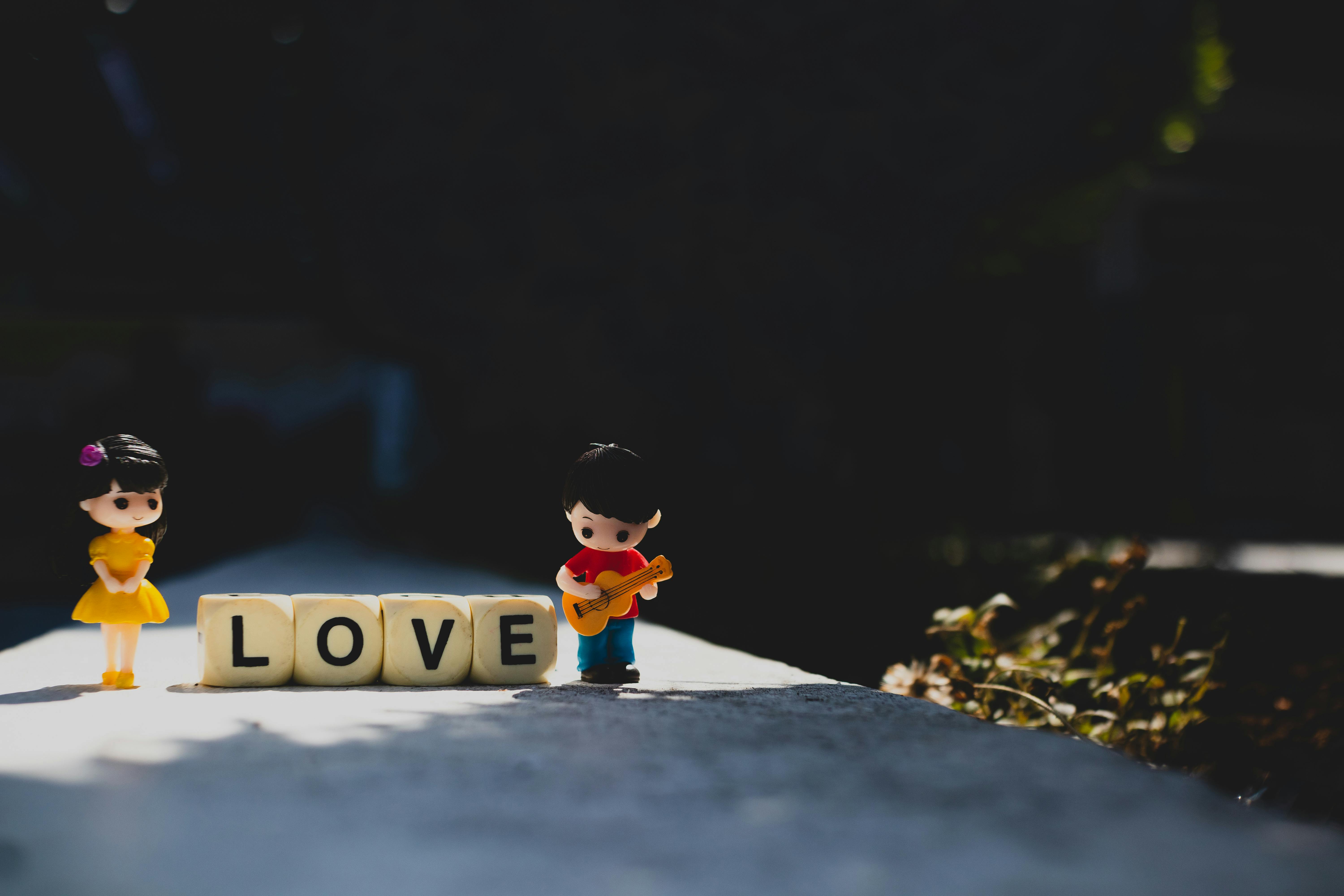 Dolls and Love Text · Free Stock Photo